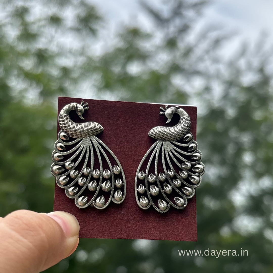 Mayura Studs – Handcrafted German Silver Peacock Earrings by DAYERA